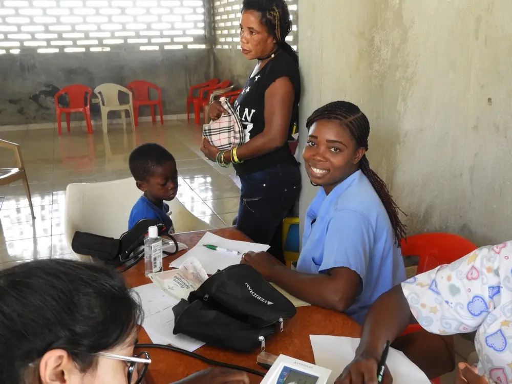 Medical professional documenting patient information